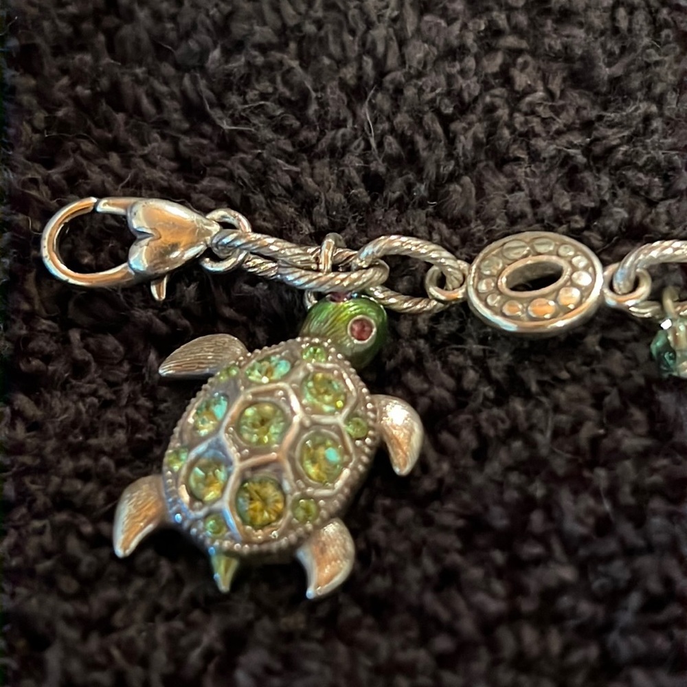Brighton Turtle charm bracelet.  Gently used.  Silver with green gem stones.